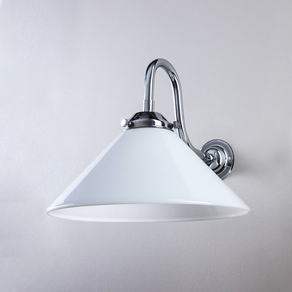 An Old School Electric Conical Glass Wall Light (B22) fitting on a white wall.