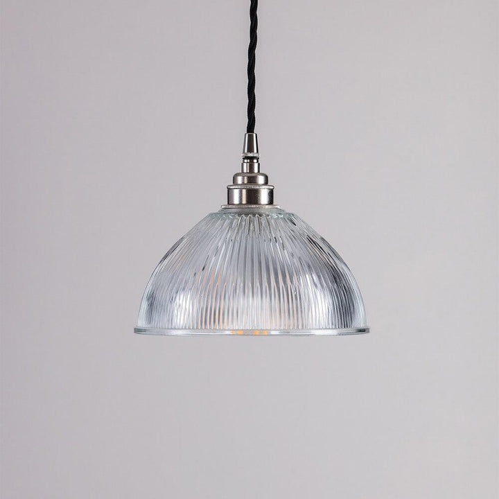 An Old School Electric Prismatic Dome Pendant Light lighting fixture.