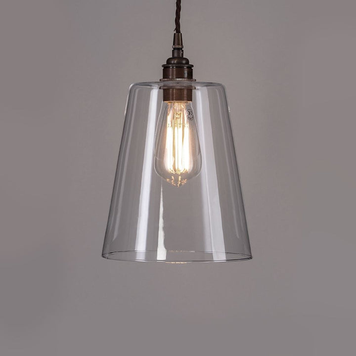 An Old School Electric Tapered Blown Glass Pendant Light with a glass shade and a metal chain.