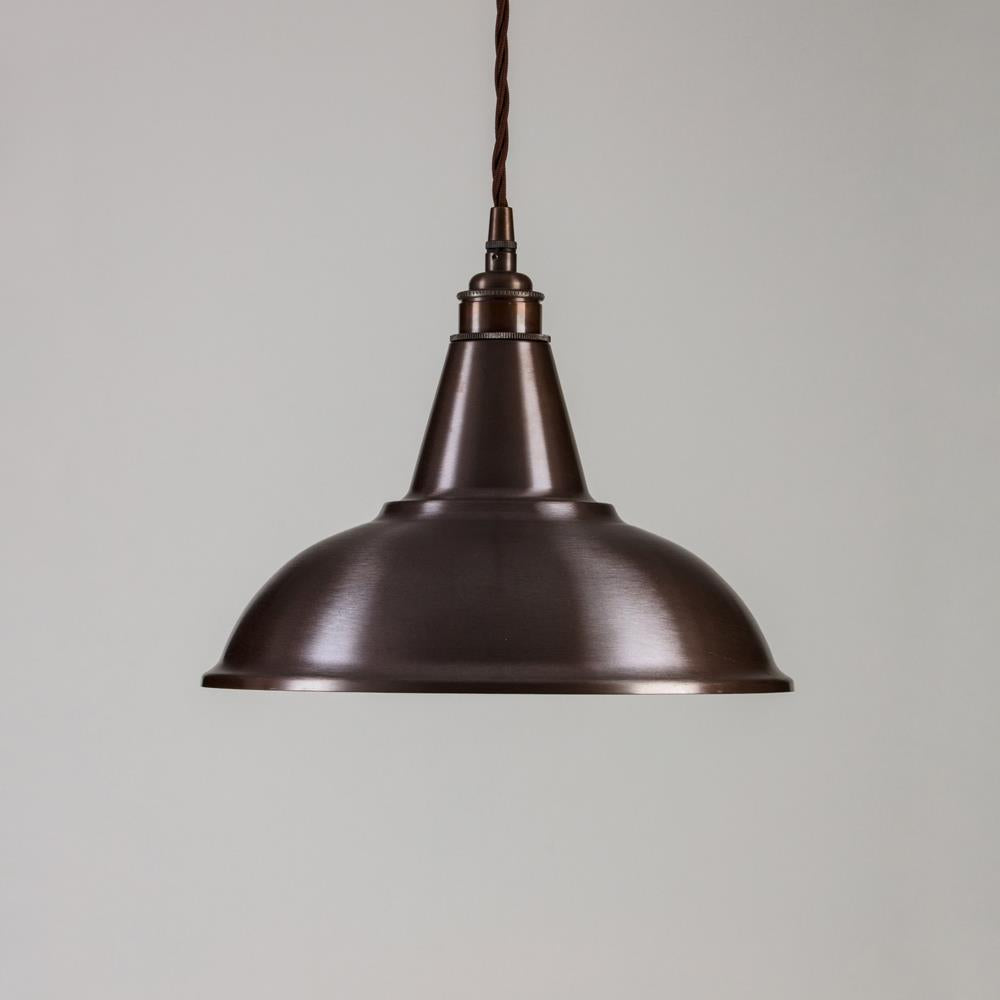 An Old School Electric Factory Pendant Light, a lighting fixture hanging from a ceiling.