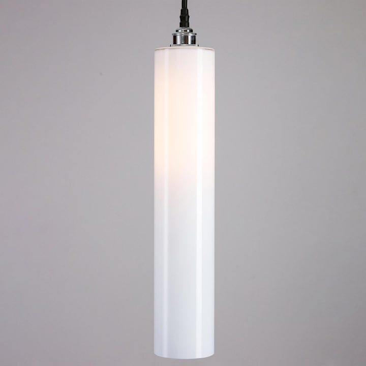 An Old School Electric Parker Bathroom Pendant Light with a shade.