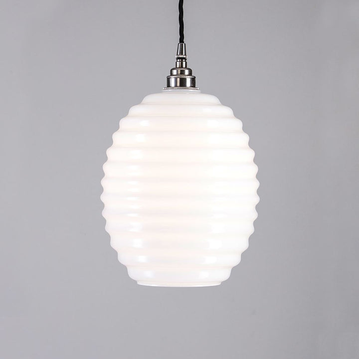 An Old School Electric Beehive Pendant Light with a white glass shade, perfect for illuminating any space.