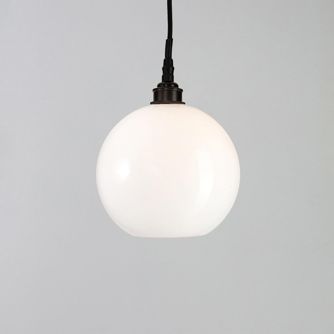 An Old School Electric Adderley Bathroom Pendant Light with a white glass globe, perfect for any lighting fixtures.