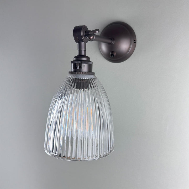 Elongated Prismatic Adjustable Arm Wall Light