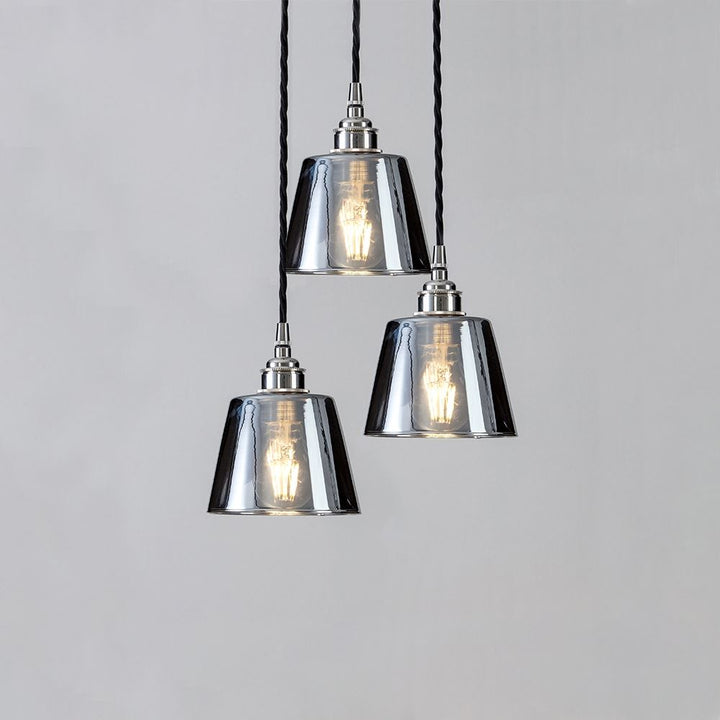 Three Old School Electric Blown Smoked Glass Cluster Pendant Lights hanging on a white background.