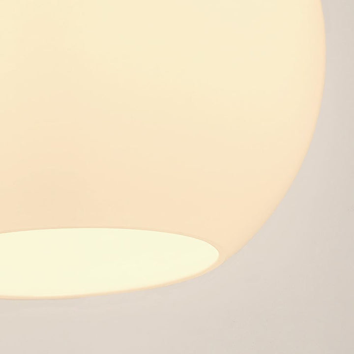 A Adderley Pendant Light with a white ball on it made by Old School Electric.
