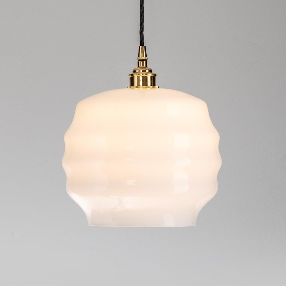 An Old School Electric Deco Opal Glass Pendant with a brass finish. This elegant light fitting blends seamlessly with any decor, illuminating your space with a warm and inviting glow. Perfect for adding a touch of sophistication.