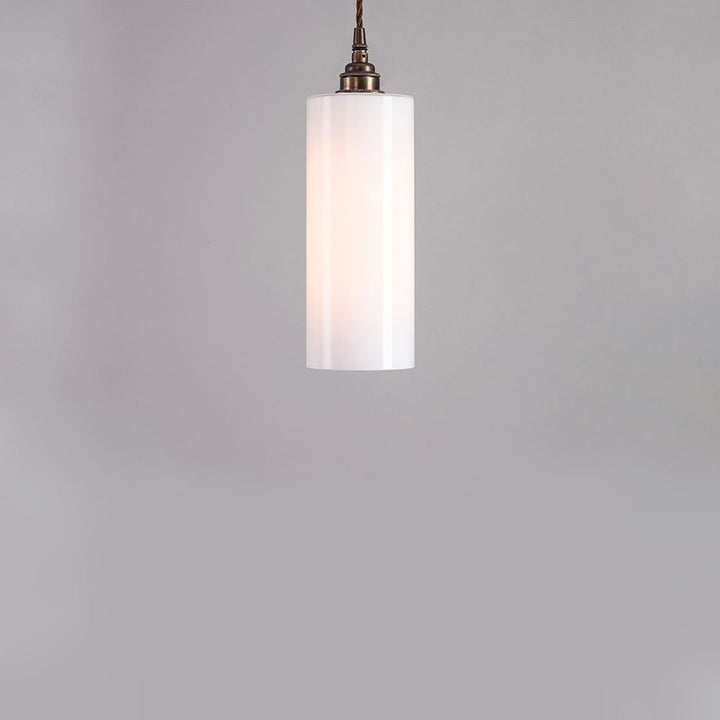 An Old School Electric Parker Pendant Light fitting with a white glass shade.
