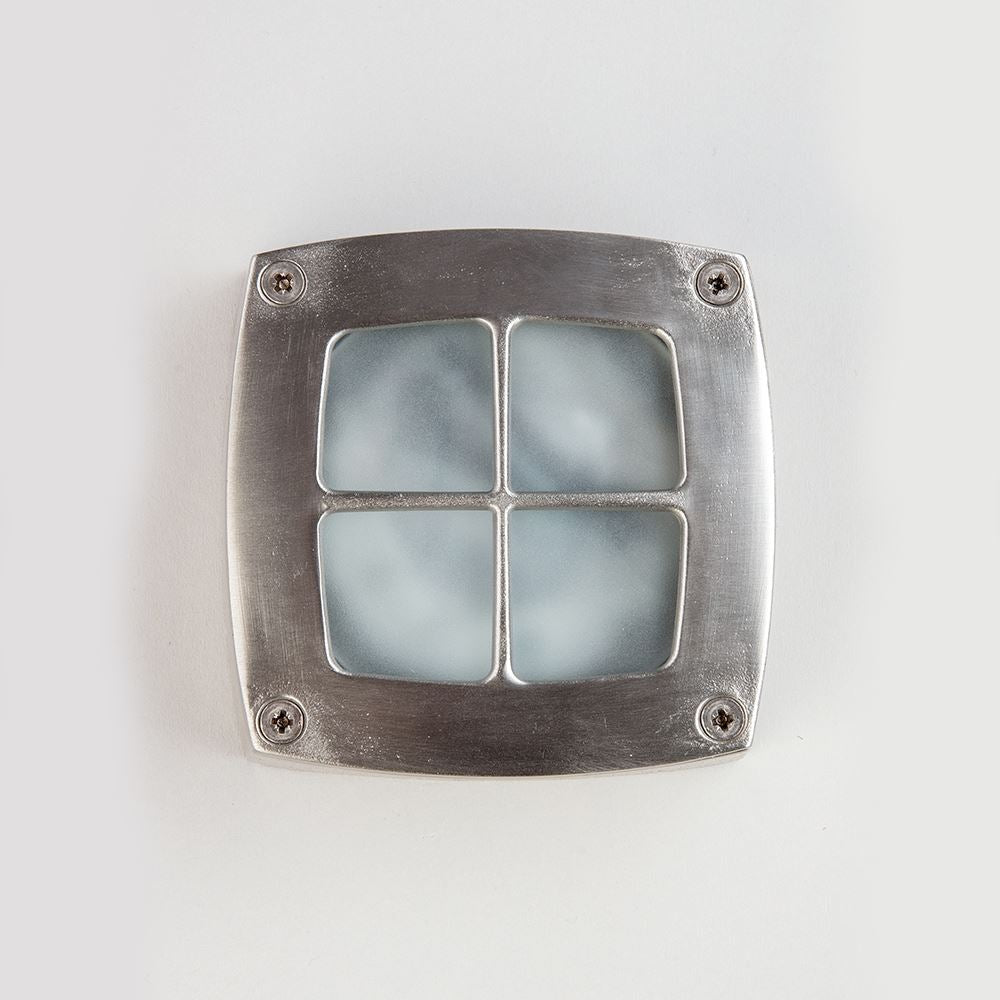 An Old School Electric square stainless steel light with a blue glass shade, perfect for adding a pop of color to any space.