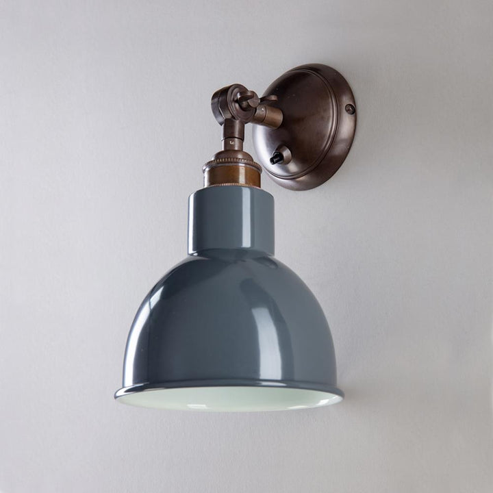 An Old School Electric Churchill Short Arm Wall Light with a grey shade.