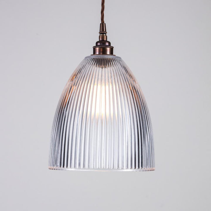 An Elongated Prismatic Pendant Light with a clear glass shade, perfect for Old School Electric lighting fixtures.