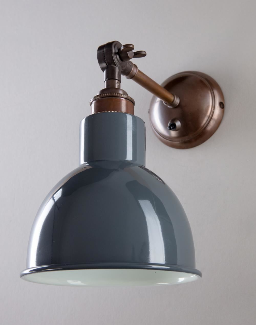 An Churchill Coloured Shades Wall Light from Old School Electric, an industrial style wall light with a blue shade, perfect for lighting fixtures.