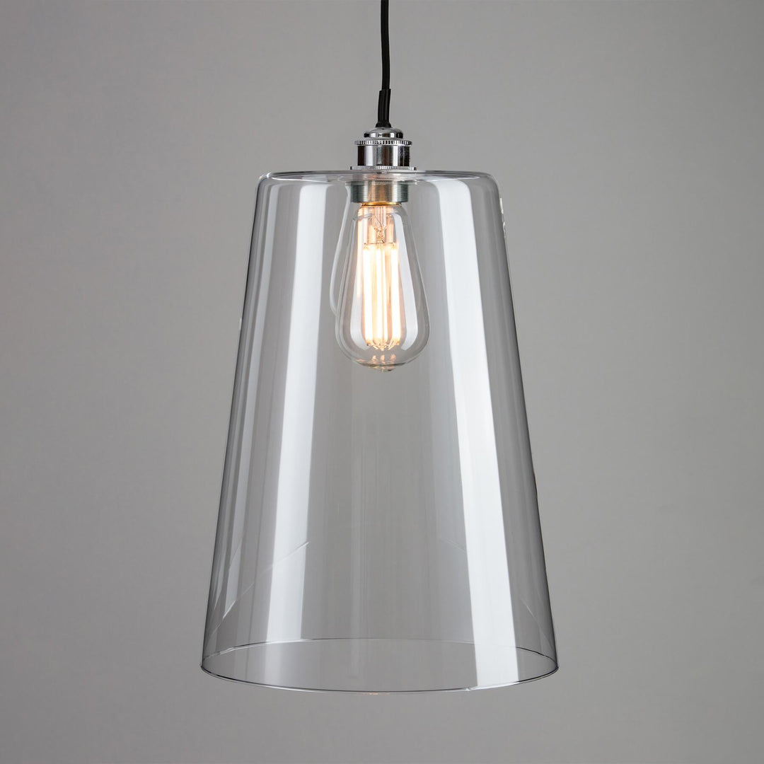An Old School Electric Tapered Blown Glass Bathroom Pendant Light, with a light bulb, providing elegant lighting fixtures.