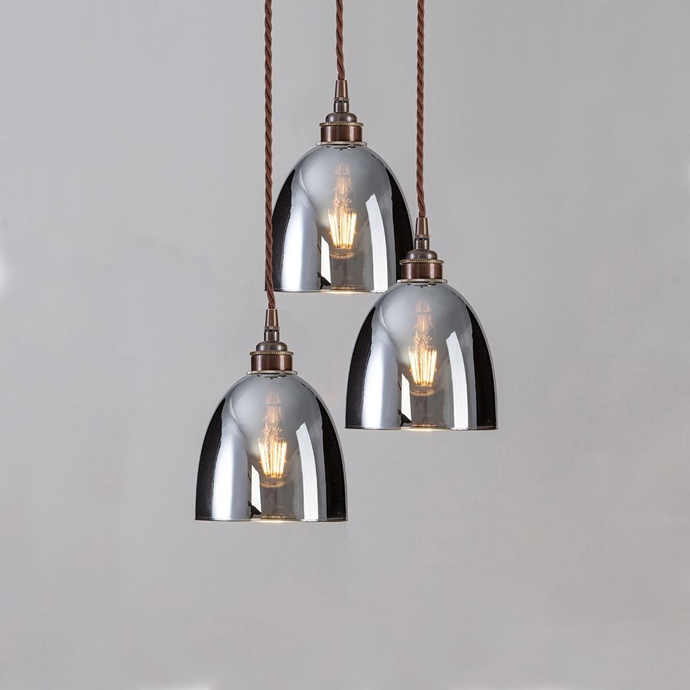 Three Old School Electric Blown Smoked Glass Cluster Pendant Light fittings hanging on a white background.