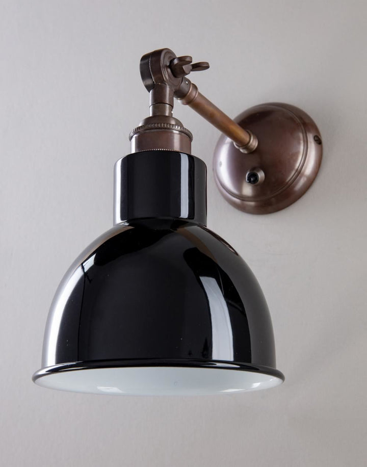 An Old School Electric industrial style Churchill Coloured Shades Wall Light with a black shade.