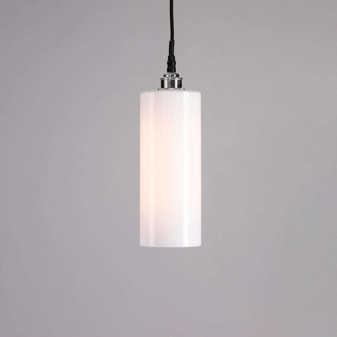 An Old School Electric Parker Bathroom Pendant Light fitting hanging on a gray wall.